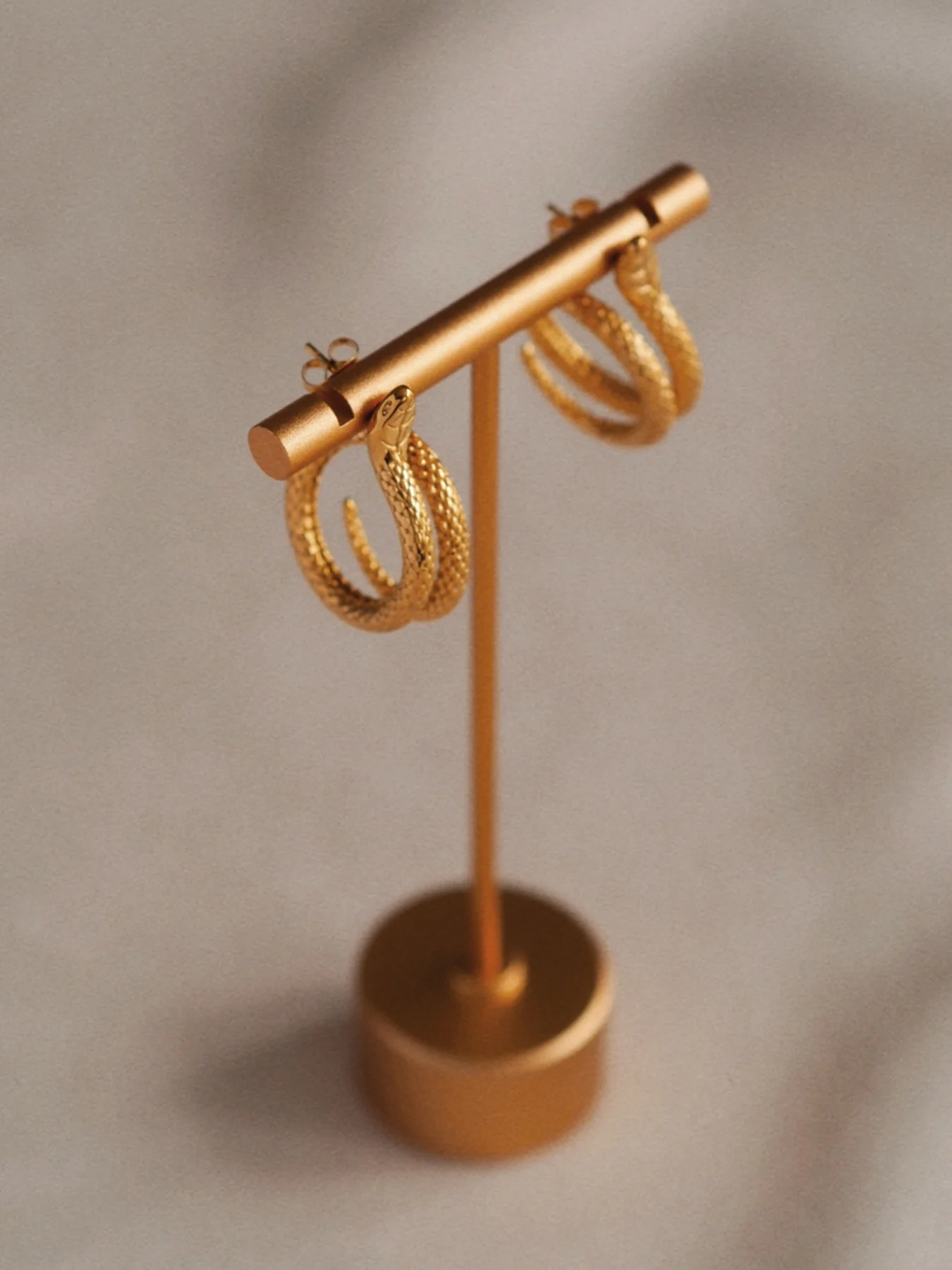 Elegant Snake Studs in Gold - Image 4
