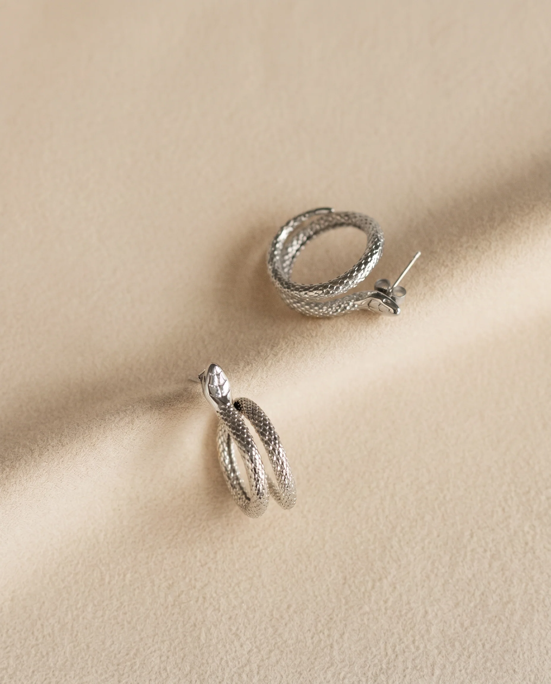Elegant Snake Studs in Silver