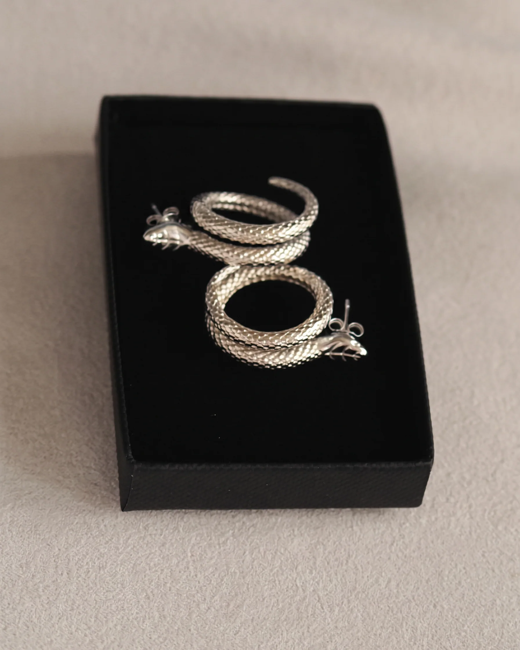 Elegant Snake Studs in Silver - Image 3